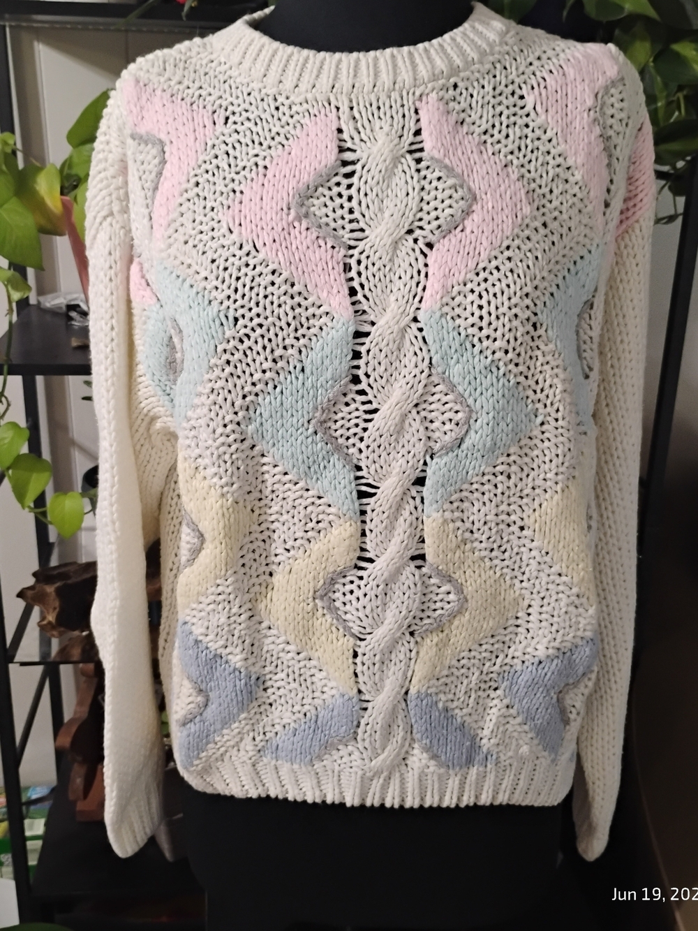 Cream Cable-Knit Sweater with Pastel Chevron Accents